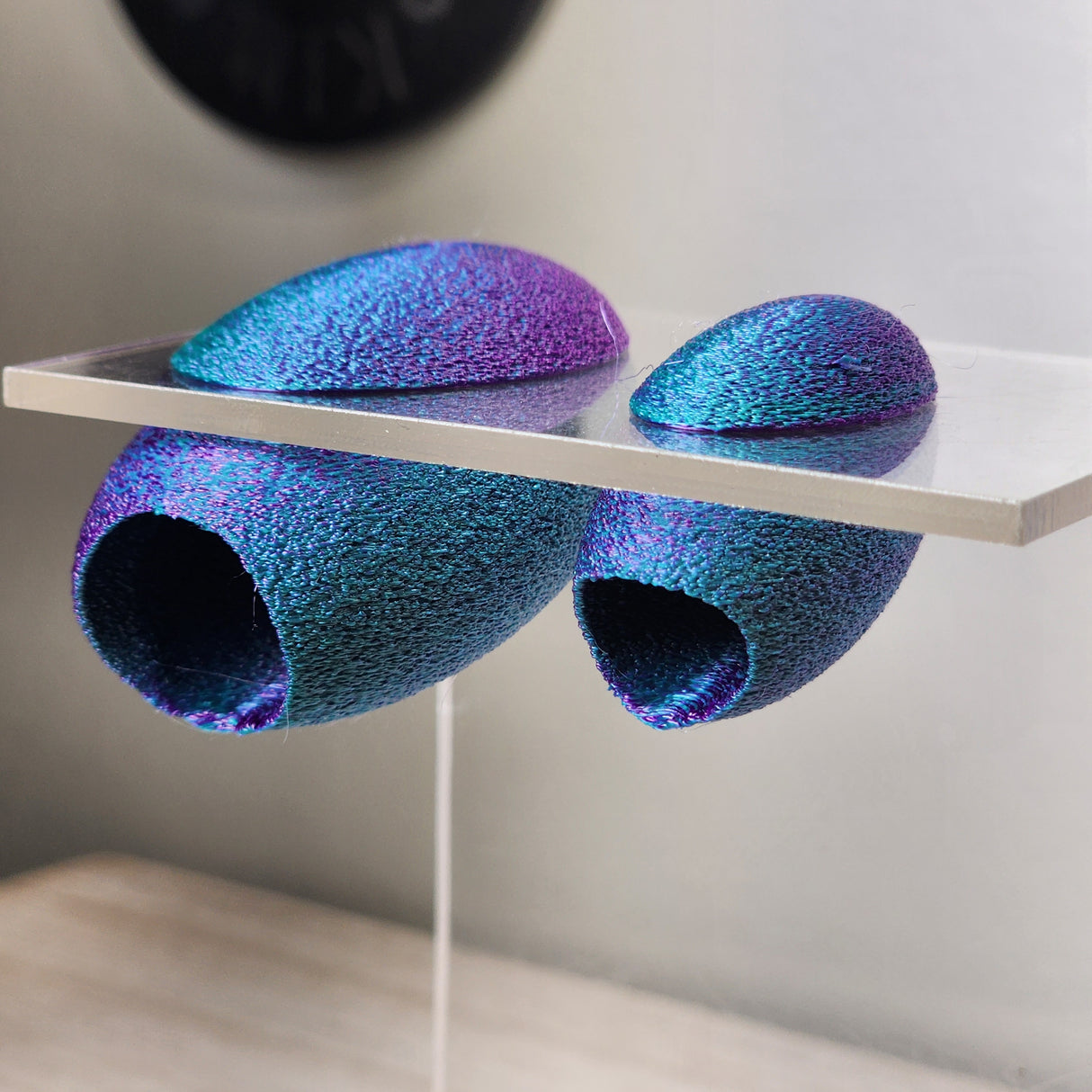 Fuzzy Cacoon Jumping Spider HIdes in 2 sizes and several colors.